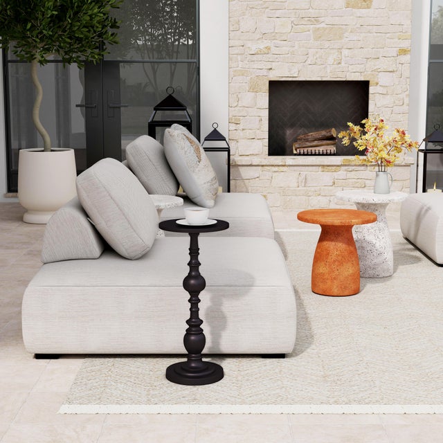 A sophisticated traditionally styled pedestal end table with a beautiful bronze finish, crafted from lightweight aluminum,...
