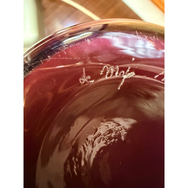 For sale is an original De Majo Murano vase, made of blown glass in a deep ruby ​​red/burgundy color, with a polished...