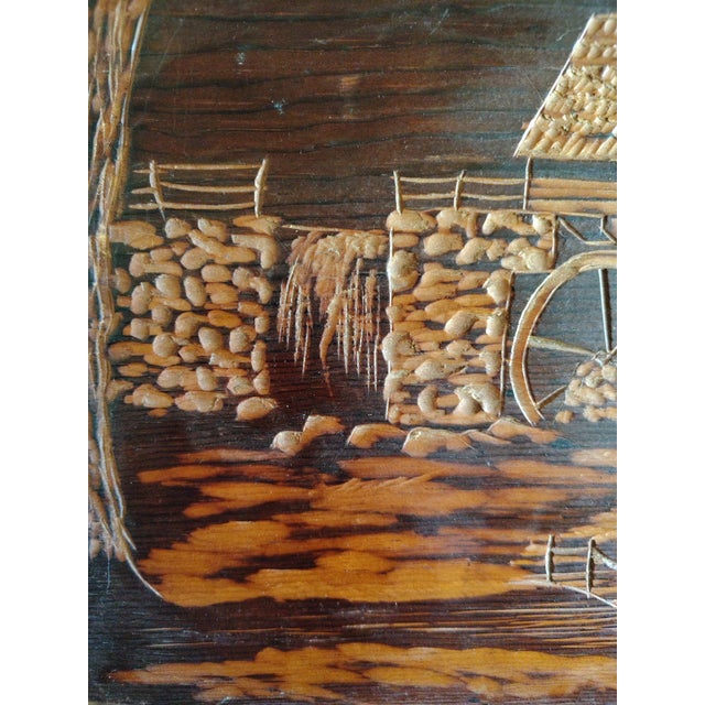 This is a Very unique one of a kind hand carved wood relief. The scene is a depiction of a classic watermill.
