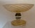 A Mid Century Murano Glass Footed Dish by Barovier and Torso. Hand blown glass with gold flecks throughout. Neck has a...