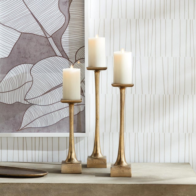 With a weighted base and tall slender body, this candle stand is a smart design. With classic lines, it plays well in the...