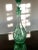 The Vintage Bohemian Elegant Cut to Clear Emerald Green Liquor Decanter is a unique and elegant piece of drinkware. Made...