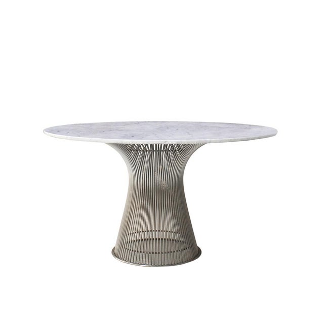 Dining table designed by Warren Platner edited by Knoll, composed of a steel structure with welded rods creating curved...