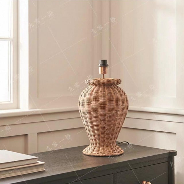 Full-body hand-woven with natural rattan, vase-shaped lamp body and fan-shaped rattan shade. Warm light through rattan...