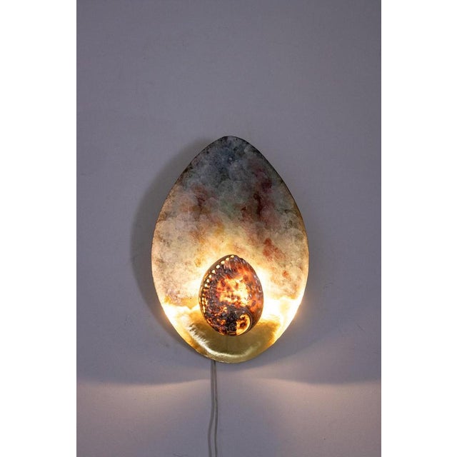 Paua Model Wall Lights, in Good conditions. This piece is designed in the style of the selected designer and/or...