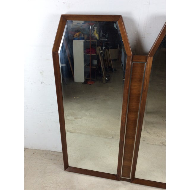 This mid century modern mirror features unique mirror configuration with two hexagonal mirror panels in a beautiful...