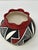 A beautifully hand-crafted Acoma Pueblo pottery jar signed “M. Chino,” featuring striking geometric decoration in...