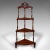 This is an antique corner whatnot. An English, walnut country house display stand, dating to the Victorian period, circa...