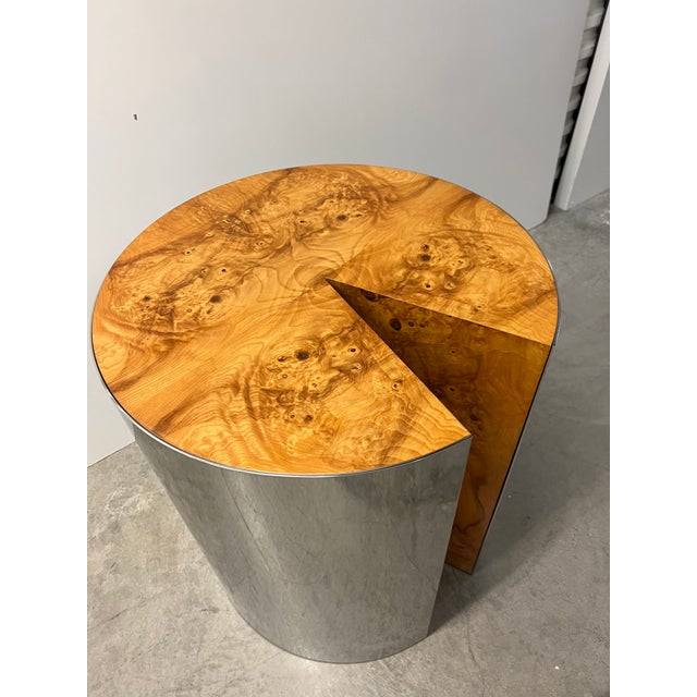 Pace designer Leon Rosen. Burlwood and Polished Stainless Steel Pedestal Dining Table has a thick polished Stainless Steel...