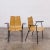 Pair of split-seat molded teak plywood GA model dining armchairs with black lacquer finished steel frames by Hans Bellmann...