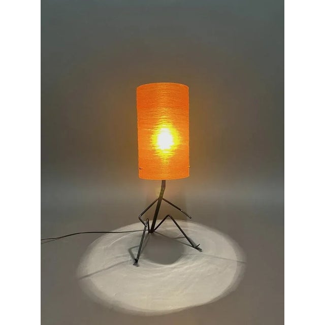 Black metal foot, lampshade in orange resin. European Plug (up to 250V).The wiring of this item may be original and might...