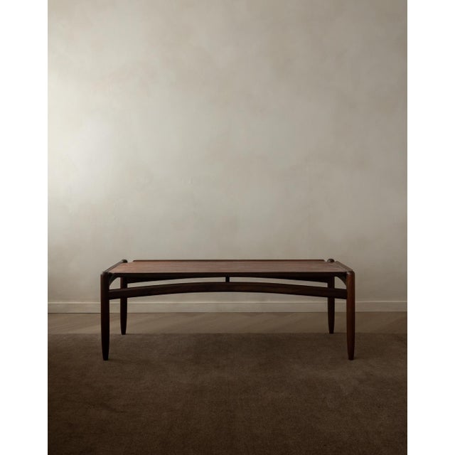 A beautifully proportioned vintage teak coffee table with a refined scandinavian look and a quietly sculptural base. The...