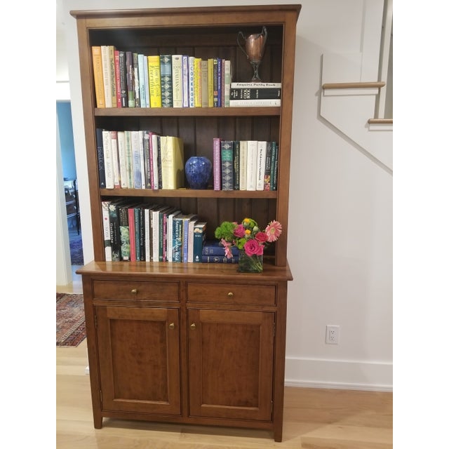 Made in two pieces, a chest base and the bookshelf top. At 42" wide and 88" tall, this piece has plenty of storage for...