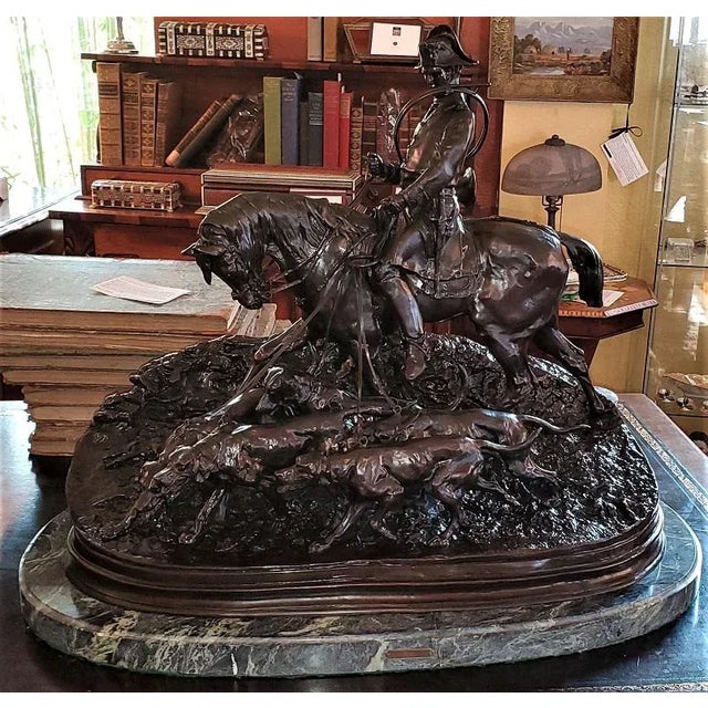 Presenting an absolutely stunning large Huntsman with his hounds bronze sculpture by PJ Mene 1869. This is a large...