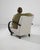 This 1950s Czech Wooden Armchair by J. Halabala is a striking example of early 20th-century modernist design, blending...