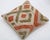 A one-of-a-kind handwoven Afghan wool kilim accent pillow featuring stepped diamond lattice. Cut and sewn by hand from a...