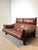 Beautiful vintage 2-seater sofa designed by Gerard Van Den Berg for Montis, upholstered in rich cognac brown leather. This...