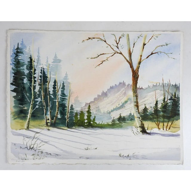 Vintage late 20th century watercolor on paper painting of a snowy winter landscape. Unsigned. Unframed.