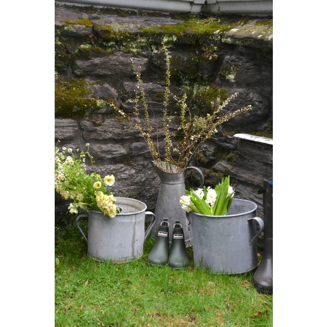 A bucket that has actually done some work. The patina on these French galvanized pieces is the real thing, earned over...