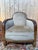 Pair of Art Deco period bergère armchairs in carved walnut and brown velvet. Seat height 38 cm