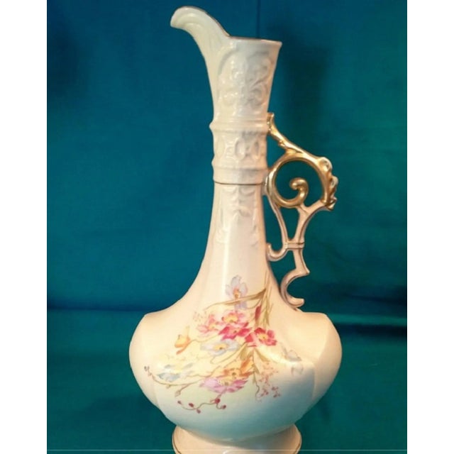Tall Rudolstadt Prussia Art Studio embossed porcelain pitcher-shaped vase with hand-painted florals, with lots of gold...