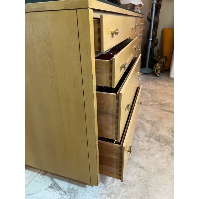 A gorgeous slice of Mid-Century Modern history. This vintage 1950s 12-drawer double dresser was manufactured by the iconic...