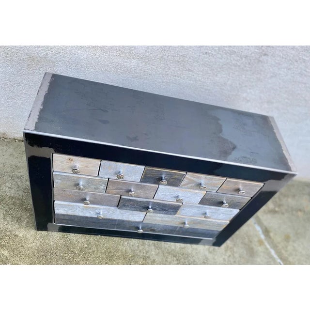 Loftboutik designer chest of drawers with 15 drawers. This metal piece of furniture is handcrafted in France. Its satin...