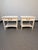 Exceptional matching pair of Neoclassical nightstands/end tables by Henredon Fine Furniture. These tables blend the...
