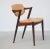 Set of twelve fully restored rosewood dining chairs with adjustable backrest by Kai Kristiansen for Schous Møbelfabrik....