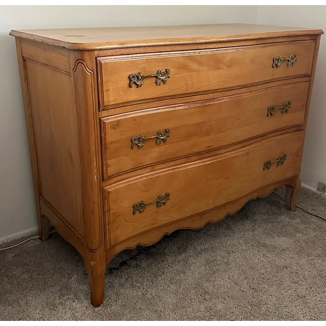 French Provincial 3-drawer commode made in solid Appalachian Beech with a warm, natural honey-oak finish, features...