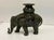 Heavy bronze cast verdigris finished candle holding elephant from Maitland Smith. (Maitland Smith label attached...