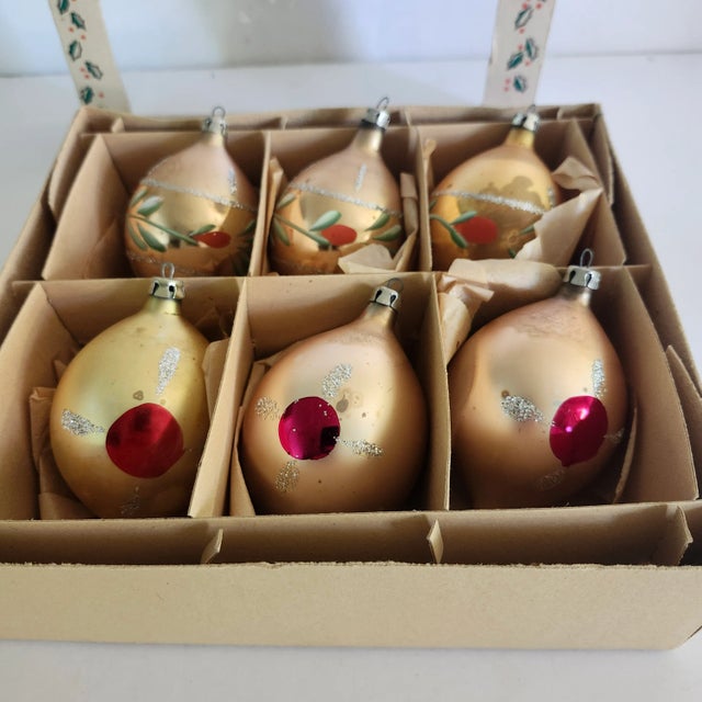 Vintage Set of 6 Starburst Christmas Ornaments in Gold. Three have a red dot on the back, and the second set of three...