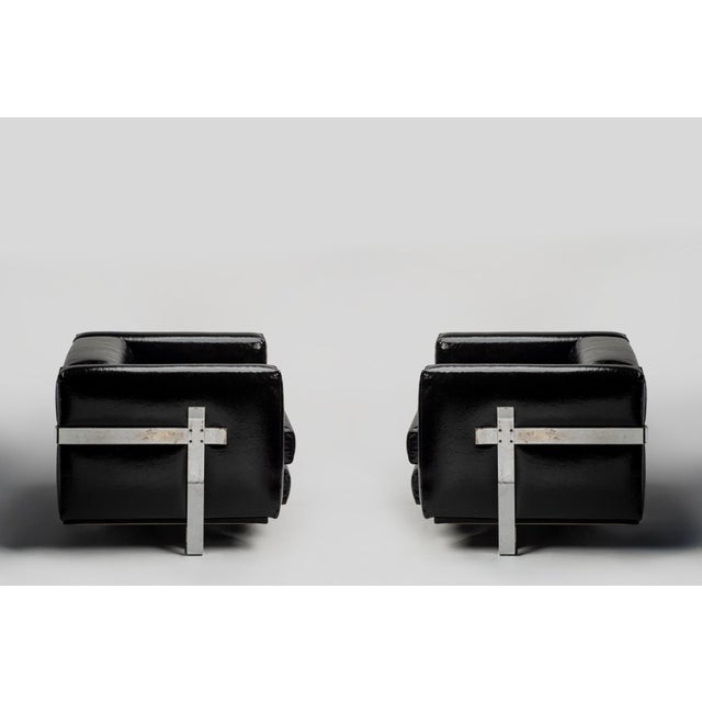 Pair of cube armchairs of Italian production from the 1960s. The attribution of these armchairs is a rather debated topic....