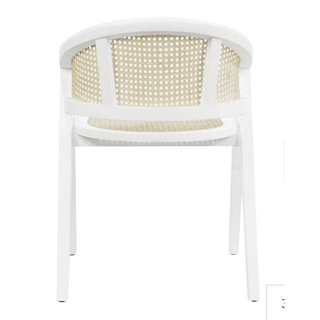 Stylish White lacquer and cane chairs - set of 4. Great dining chair or accent chairs - versatile. Can split up into...