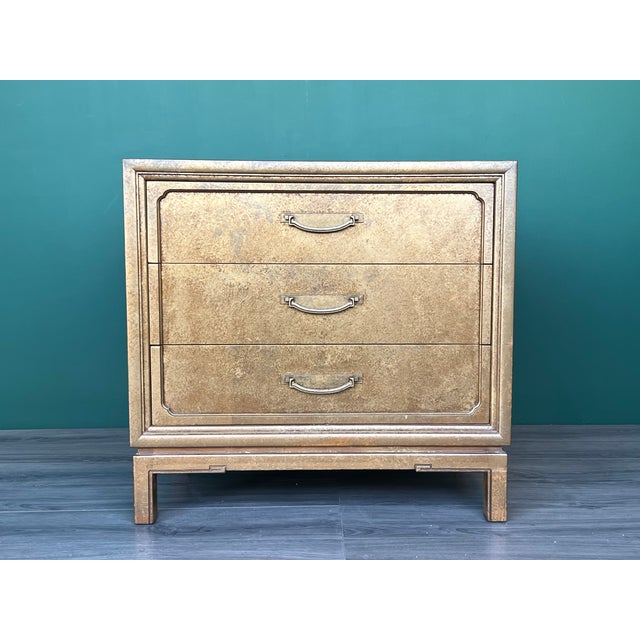 This is a solid built walnut chest of drawers with dovetail joints This chest has a high gloss metallic gold finish (it...