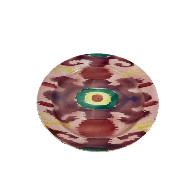 Uzbek ikat-inspired design glazed ceramic decorative plate of shallow round form, made by “Society of M.S.Kuznetsov”...