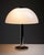 Illuminate your space with the sleek and stylish Dome table lamp by Beisl Leuchten. This German-designed lamp combines a...