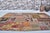 Orange Vintage Handwoven Turkish Patchwork Kilim Rug With Eclectic Tribal Motifs For Sale - Image 8 of 9