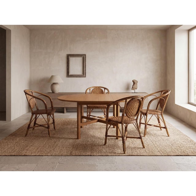 A round-topped dining table, crafted from solid oak and produced by Muebles Casablancas in Barcelona during the 1970s....