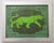 A panther or leopard silhouette in shades of army , forest, lime greens with a Chinese border. Art Deco, Abstract,...