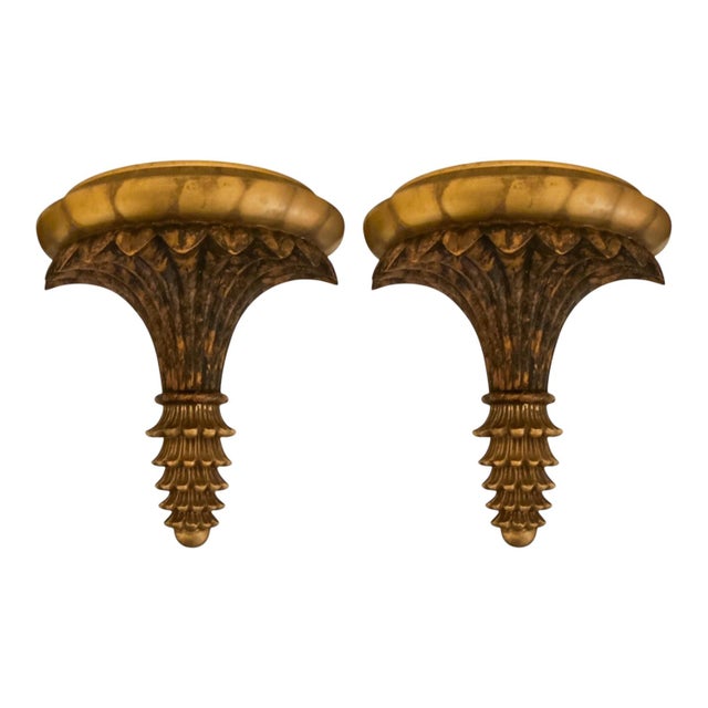 This is a pair of regency style wall brackets with a gilt a faux tortoise shell finish. They date to the later part of the...