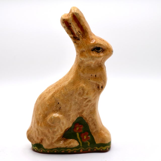 Add a touch of rustic, early American charm to your space with this vintage hand-painted chalkware rabbit figurine....