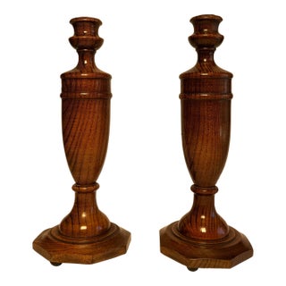 A Pair of English Traditional Empire Solid Oak Wood Candlesticks For Sale