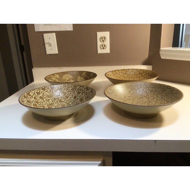 A set of 4 pieces of Japanese plate or bowls. The condition is very good, like new. No broken or scratch. Has its unique...