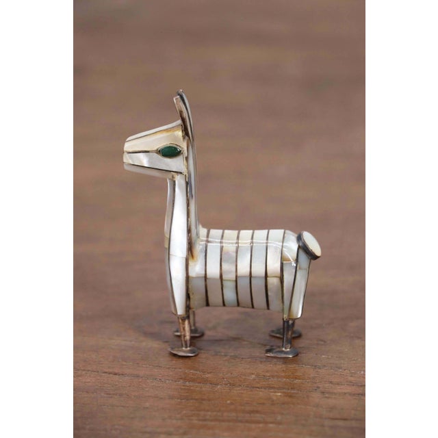 Origin: Chile. Circa: 1950. Material: Mother of Pearl and 950 Silver Purity (marked underneath). Item condition: Small...