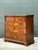 This exquisite George III style bachelor's chest is a testament to timeless English design and fine cabinetry. Crafted...