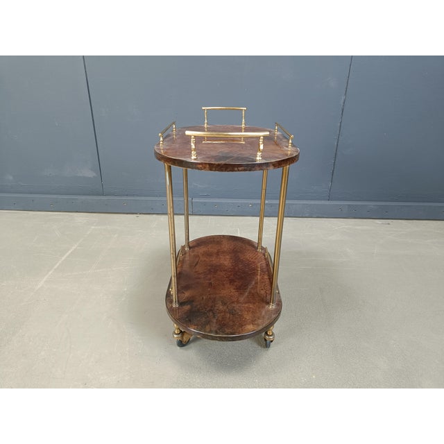 Italian Lacquered Parchment Serving Bar Cart by Aldo Tura, 1960s, in Very Good conditions. Designed 1960 to 1969 This...