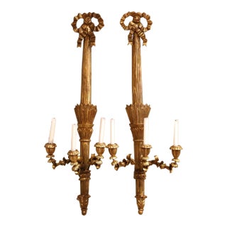 Pair of Vintage French Louis XVI Style Carved Giltwood Three-Light Wall Sconces For Sale