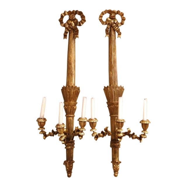 Pair of Vintage French Louis XVI Style Carved Giltwood Three-Light Wall Sconces For Sale