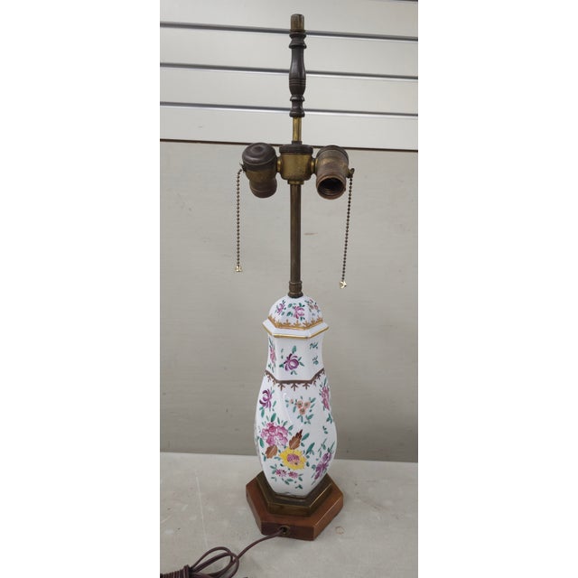 A cylindrical type Samson Porcelain Covered Vase Mounted as Lamp Measure 5.5" in width, 4.5" in depth, 24" tall to the top...